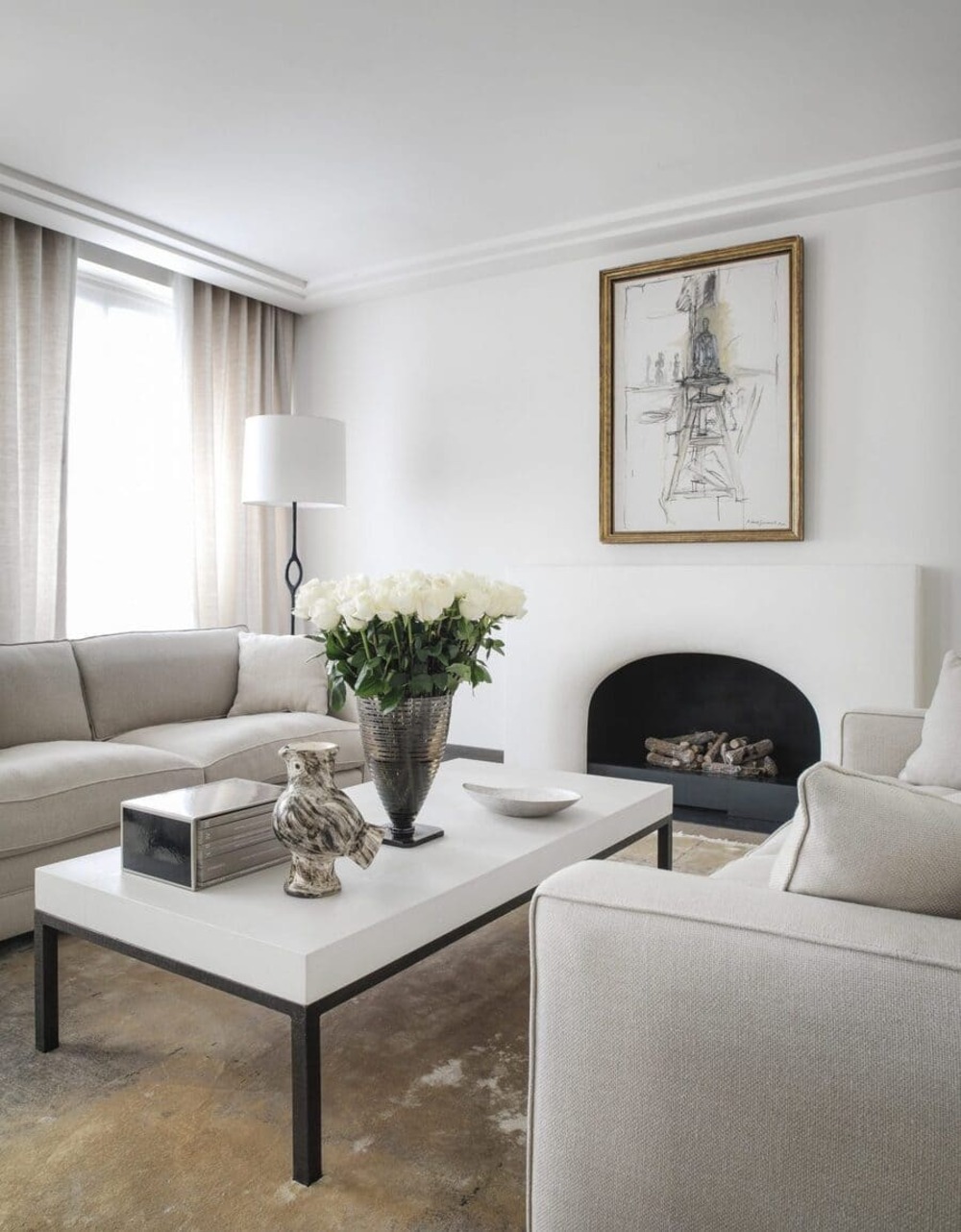 White and black are the center colors of this living room idea by Gilles Boissier with a modern contemporary design!