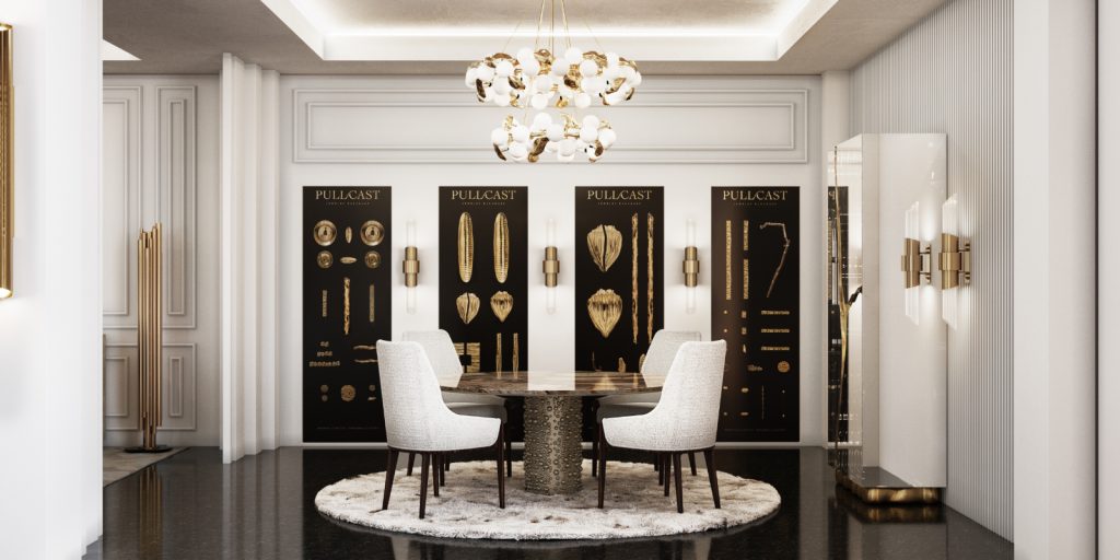 Cannes - dining room with wall lamps, a round table, white dining chairs and a two round chandelier with golden details